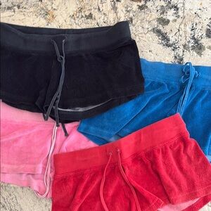 Set of Four Terry Cloth Shorts in Black, Blue, Pink, and Red